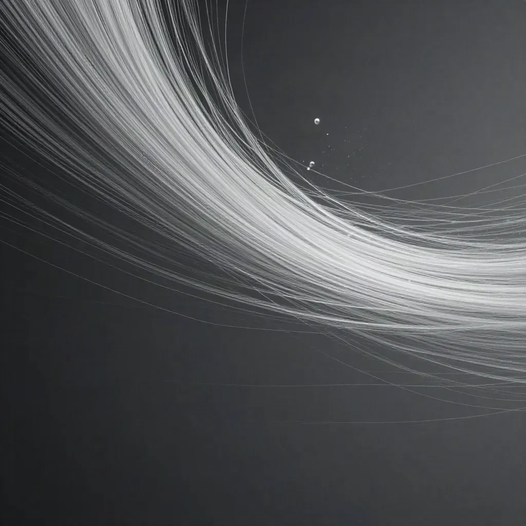 Silver light filaments bloom in graphite haze, leaving open space for copy.